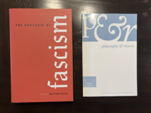 This image contains a photo of two books, "The Rhetoric of Fascism" and "Philosophy & Rhetoric"